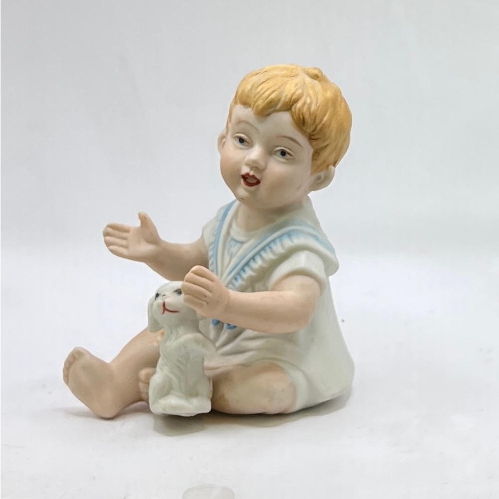 Royal Crown Porcelain Bisque Piano Baby